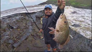 Fishing in Goa/ India monsoon fishing from rocky shore