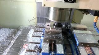 Hurco VMX42 CNC Mill Cutting an Aluminum Handle