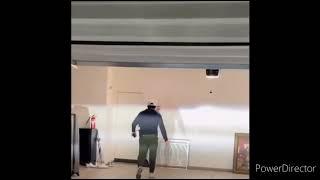 guy hits his head against the garage door