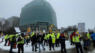 Canada Post workers rally at headquarters as strike enters fourth week