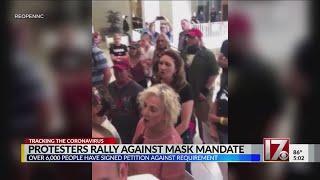 Protesters rally against mask mandate