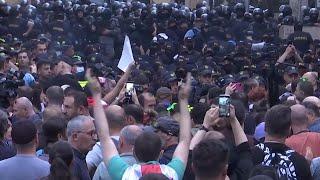 Thousands rally in Tbilisi as Georgia's parliament adopts law in second reading