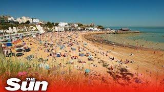 Beaches packed on UK's hottest day despite distancing rules