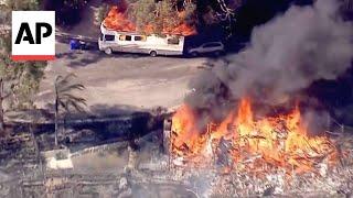 Brush fire in San Bernardino, California, destroys several homes