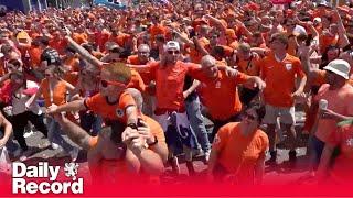 Dutch fans perform ‘Links Rechts’ ahead of the Netherlands' Euro 2024 semi-final against England