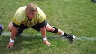 UNI quarterback Pat Grace stretching prior to practice (Aug. 6, 2009)