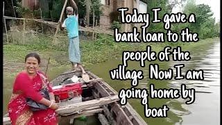 Today I gave a bank loan to the people of the village  Now I am going home by boat