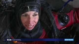 Female Divers are Diving with Neoprene Drysuit and Cressi Full Face Mask in Iced Lake