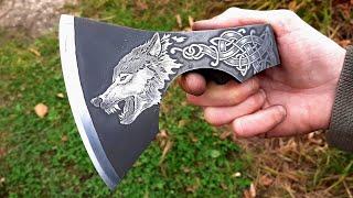 Drawing on metal. Steel wolf. Made from a rusty axe