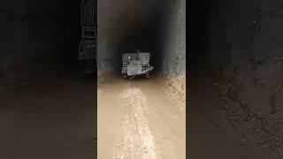 Wet shotcrete machine spraying in tunnel