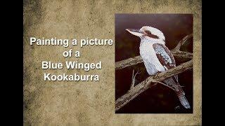 Painting a picture of a Blue Winged Kookaburra