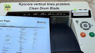 Kyocera vertical lines. Cleaning drum blade.