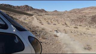 DJI Mavic 2 Zoom drone vs Aerospatiale AS350BA during off-road truck race near Johnson Valley, CA