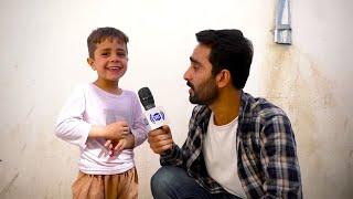 Funny words and smiles of a kid in Qalai Bakhtyar