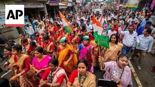 Colorful roadshows and rallies mark election campaigns in India ahead of polls