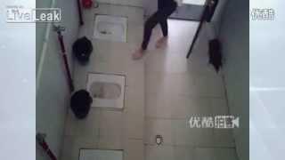 LiveLeak com   Man installing hidden camera in women's toilet busted