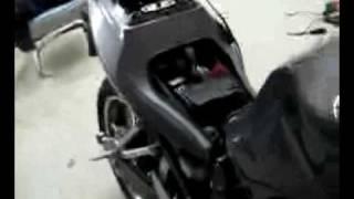 SV650S w/Holeshot high-mount slip-on