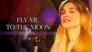 FLY ME TO THE MOON |  La Musa Marcela Mistral