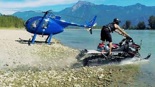 Snowmobile on water, shot from a Helicopter. Filmed in 4K!