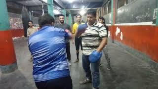 A Boxer is on PED at Azad Boxing Club Lyari.