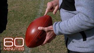 An NFL kicker's unique ball and shoes