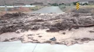 Flash Flood Washes Across Utah Desert Road