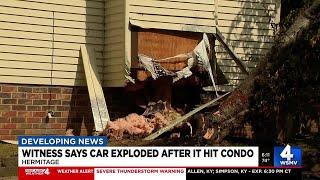 Witness says car exploded after it hit condo