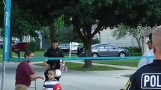 Elgin Police Officers Playing Volleyball at Five-O DJ Entertainment Block Party