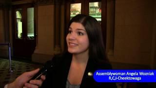 Assemblywoman Angela Wozniak reacts to Sheldon Silver's arrest