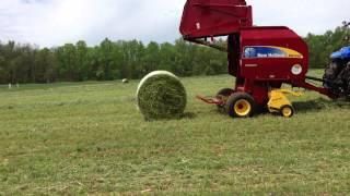 New Holland BR7060 Crop Cutter Round Baler powered by T6.155 Tractor 2013 NC Hay Day