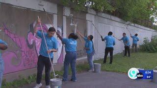 Students painting a difference in their community