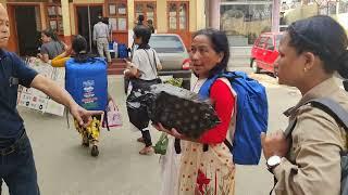 Polling personnel arrive at a city school comprising four polling booths, on April 18 afternoon .