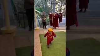 H.H The 14th Dalai Lama enjoying with a Child(Rinpoche)