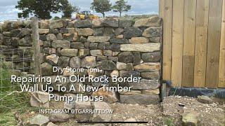 Dry Stone Walling - Repairing An Old Rock Border Wall Up To A New Timber Pump House