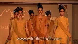 Malini Sharma walks the ramp at Monisha Bajaj's fall-winter collection show in 1999