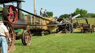 1913 Aultman Taylor steam tractor running a threshing machine