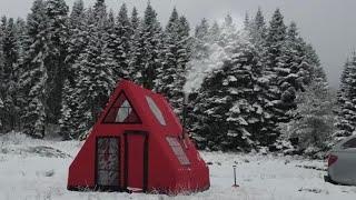 CAMPING IN A WARM TENT WITH A STOVE IN THE SNOW