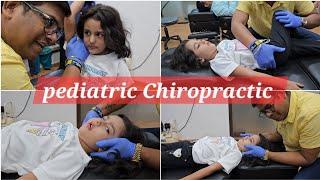 Light Chiropractic Adjustment for Child by Chiropractor Dr.Rajneesh kant.