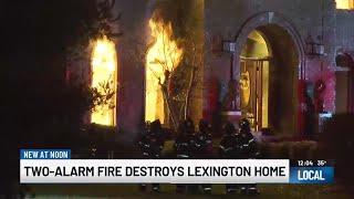 Crews battle massive fire at Lexington mansion