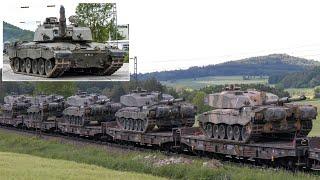 Dozens of British Army tanks arrive by train and travel on German roads  