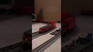 218 410 with tankers passes museum train with V200 035 and 232 611 with coil train #br #nscale