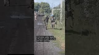 Ukrainian soldier leads a Russian occupier who has just been captured #warinukraine #united24media