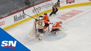 Brad Marchand Throws Justin Braun Into The Net & Slew Foots Oskar Lindblom