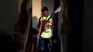 Mayello singing with mukui WA miti Tala Boys Band