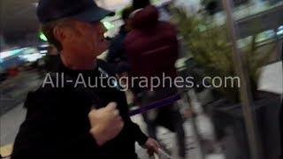 Sean Penn leaving Paris and refusing to sign autographs