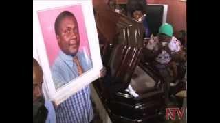 Kasiwuukiira mourned by hundreds at his home.