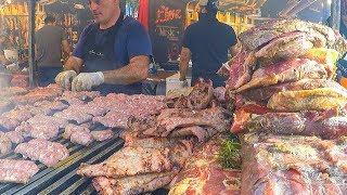Grilled Meat Roasted Texas Style. Juicy Pork Loin, Ribs and more. Street Food Fair in Italy