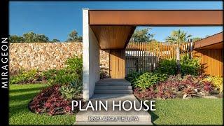 Internal Courtyards and Walkways Connect the Pieces of the Plain House