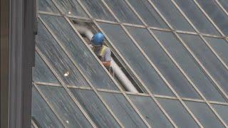 More glass falls from downtown Houston buildings after another storm moves through