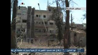 Syrian TV shows impact of heavy shelling in Homs